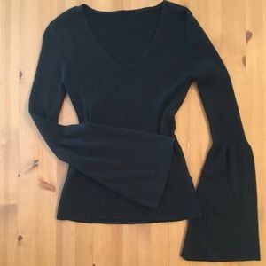 Black sweater with flared sleeves